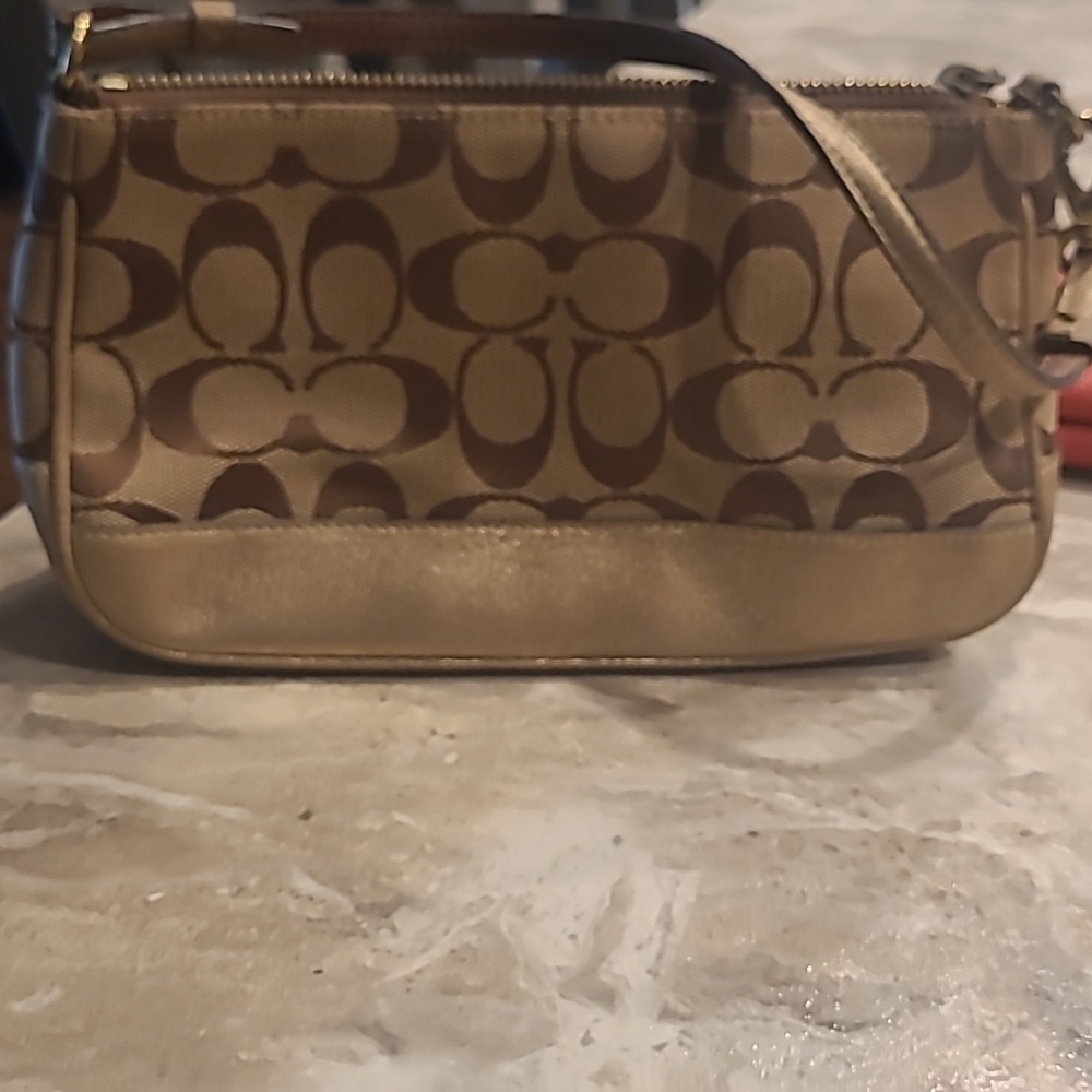 Gold small coach purse